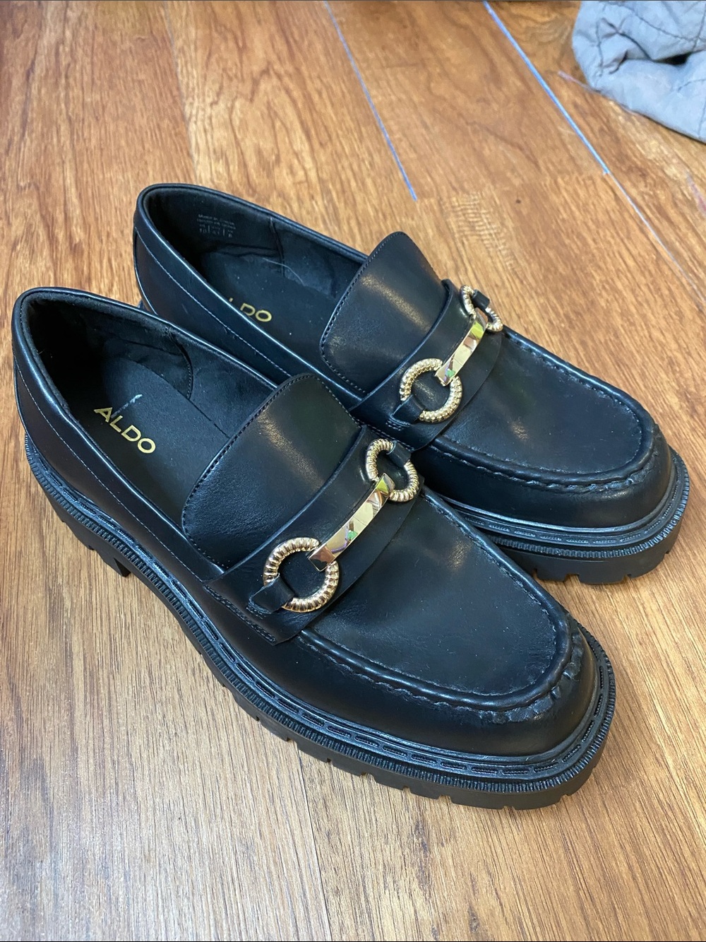 Aldo Black Leather Loafers with Gold Chain Accent